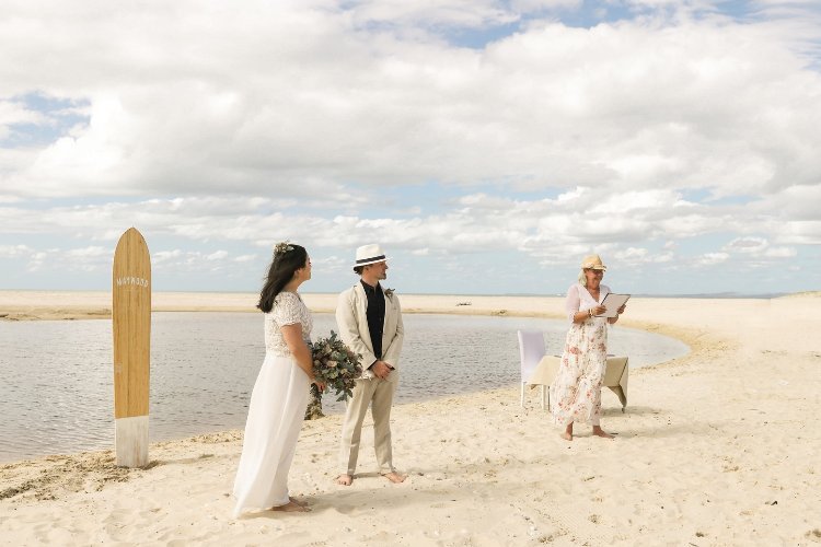 Beach wedding ceremony by Bridie Island marriage celebrant Tracey