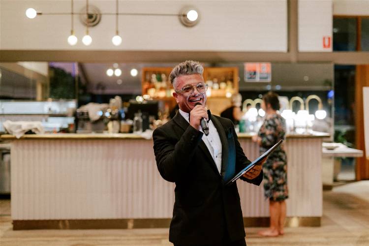 Celebrant and MC Paul Wheeler officiating a wedding reception