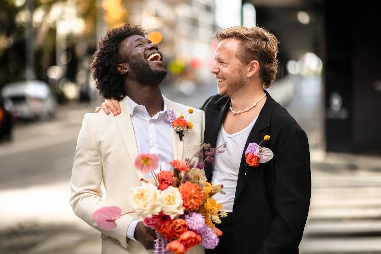 Emotive gay wedding photo by Carlita Sari in Sydney