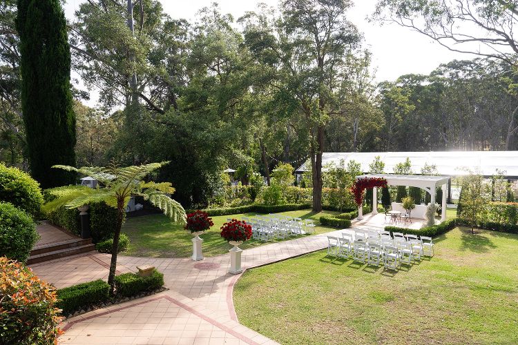 Garden wedding area with ceremony setup on lawn at Springfield House