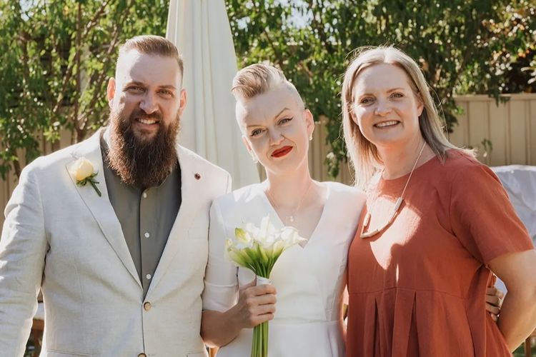 Heidi Kay with just married couple in a short-time-frame wedding ceremony