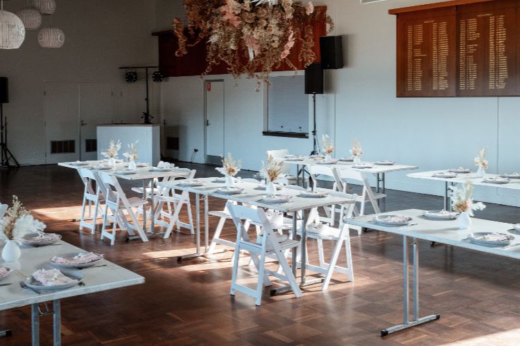 Blank canvas function hall with DIY wedding reception at Killcare Surf Club