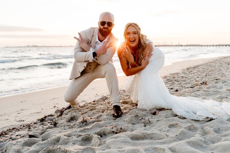 Photo of Bride & Groom on beach by Melbourne wedding photographer Belle Martin
