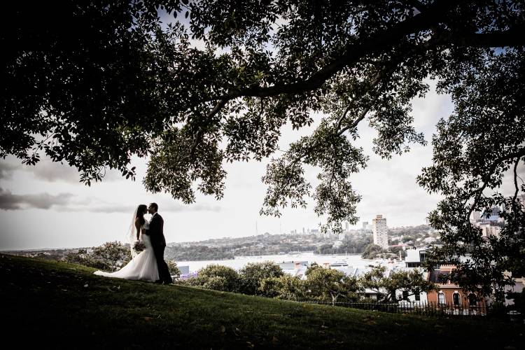Candid wedding photo at Observatory Hill by Sophie Granger
