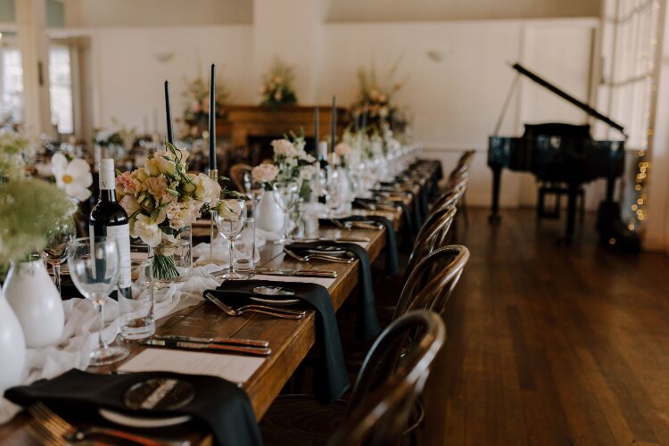 Elegant reception space with a grand piano at Wandin Valley Estate
