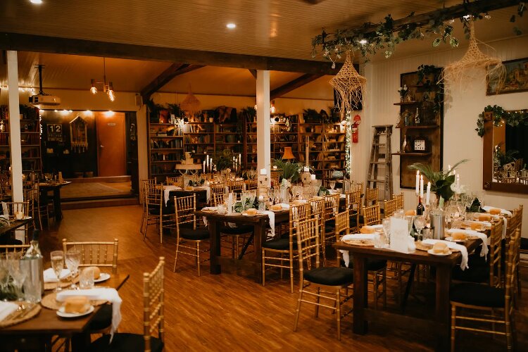 Rustic reception space with book shelves at Sylvan Glen in Southern Highlands