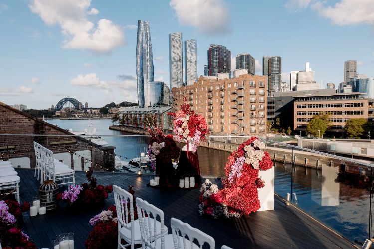 Small wedding ceremony on outdoor deck at Doltone House Jones Bay Wharf