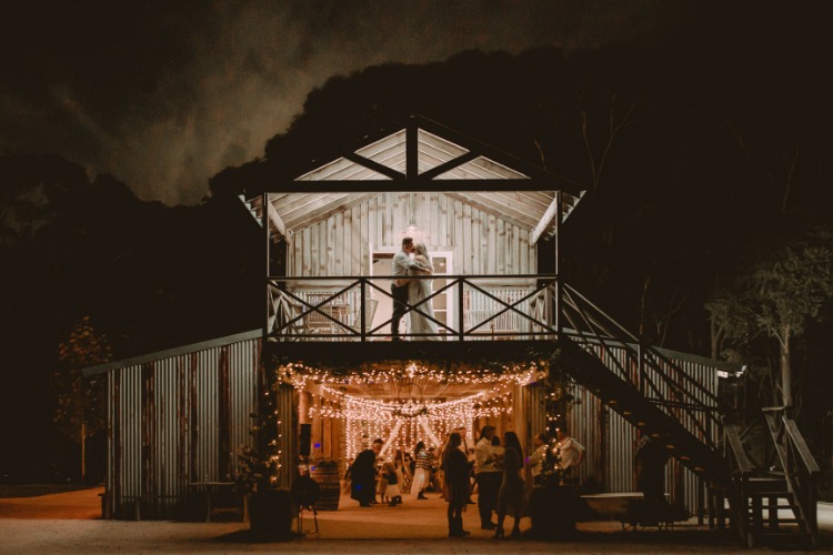 Stables wedding reception in the fairy lit barn at The Stables of Somersby