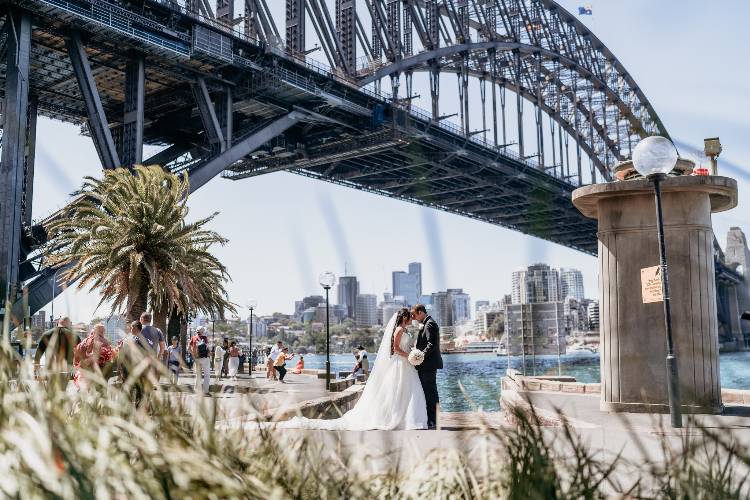 Wedding photo and video frame of Bride & Groom under Sydney Harbour Bridge