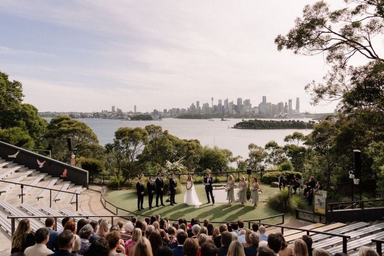 Outdoor wedding ceremony at Taronga Zoo's Bird Amphitheatre on Sydney Harbour