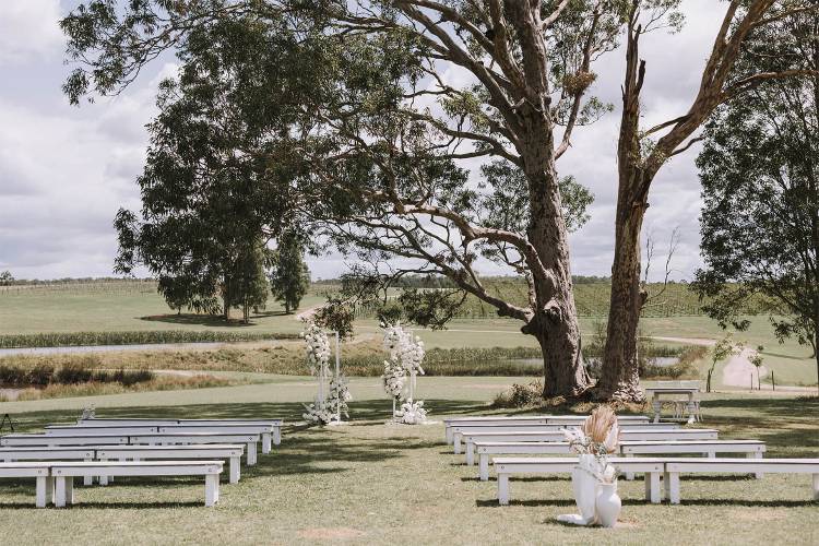 Elegant wedding ceremony overlooking Squires Vineyard in the Hunter Valley