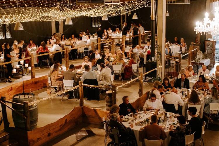 Warm lit barn wedding reception at Oaklands Event Centre in NSW