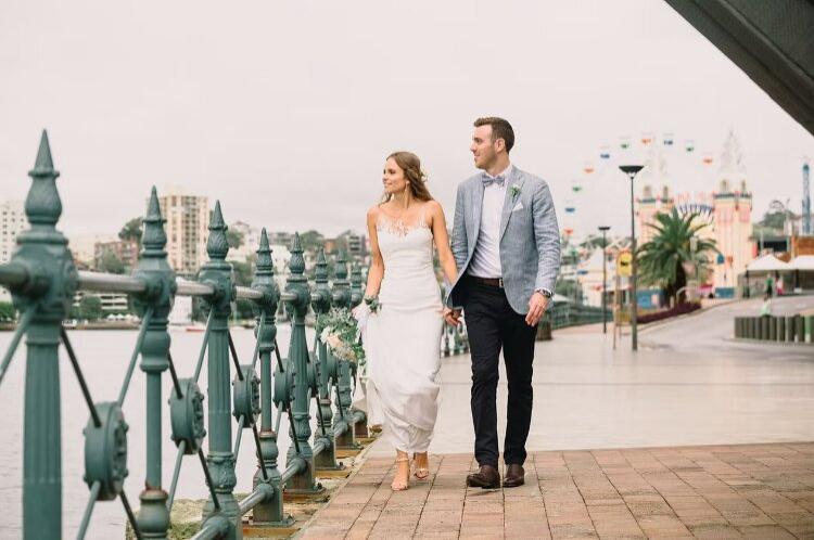 Candid imagery of Bride & Groom near Luna Park shot by Daniel Kukec