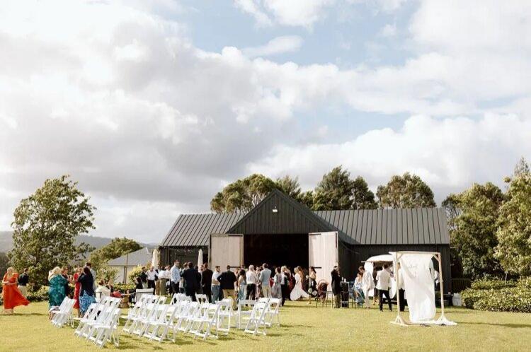 Rustic wedding hall with outdoor ceremony space at Linnaeus Farm