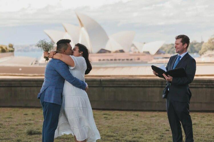 Simple elopement ceremony at the Sydney Opera House by Mick Goldie