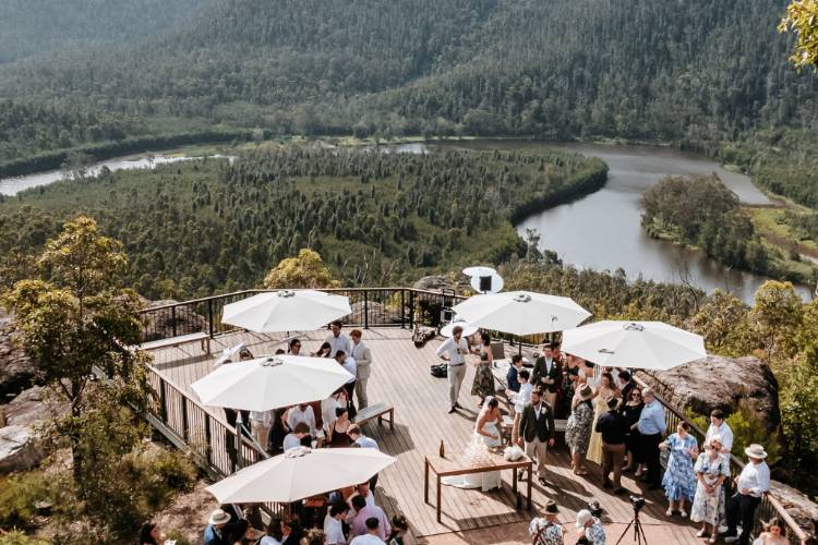 Wedding guests gathering on the sunset deck at Kangaroo Valley Bush Retreat