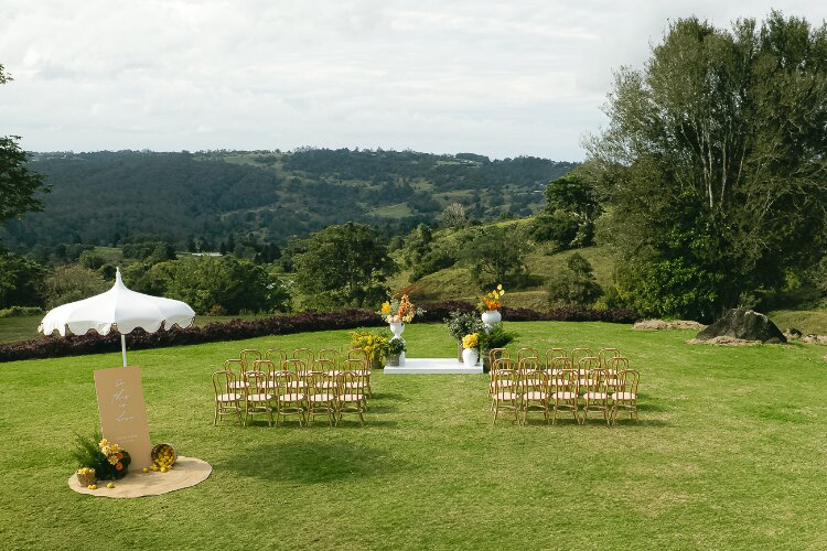 Wedding ceremony on lawn at Maleny Country Estate Sunshine Coast Hinterland
