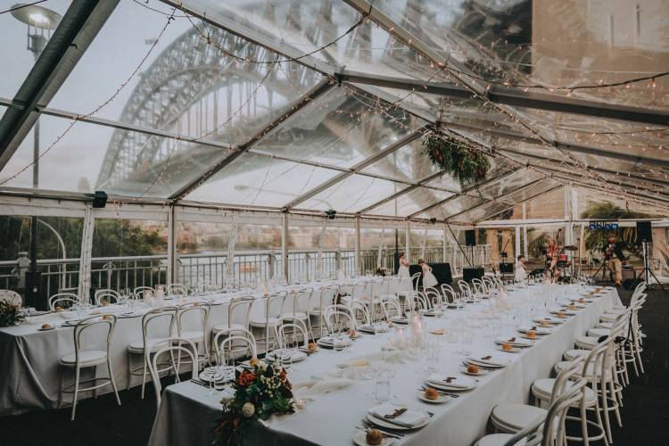 Marquee wedding reception at Pier One Sydney Harbour with Harbour Bridge views