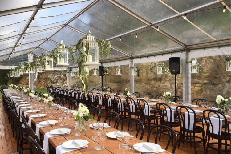 Simple marquee wedding reception at St Joseph’s Guesthouse with timber floors